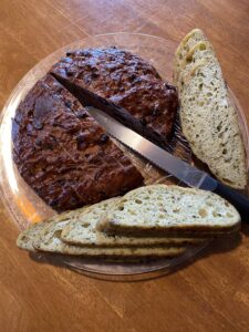 a large platter of sliced whole grain bread